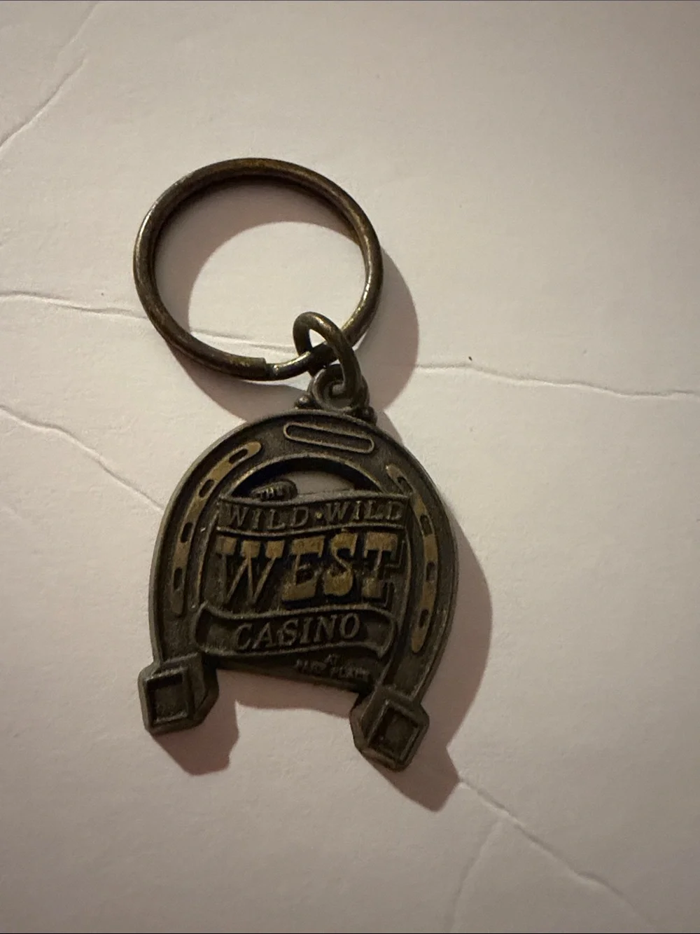 Wild Wild West Casino Las Vegas NV Horseshoe Metal Keychain Vintage Souvenir